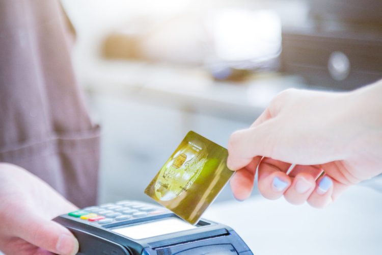 Card payment with chip and pin machine in shop